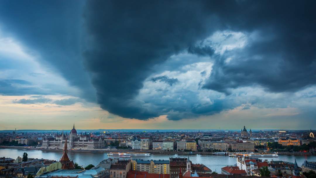 Hungarian landscape experiencing a weather front, emphasizing the importance of weather preparation when relocating